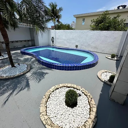 Casa Temporada 02 Dormitorios Com Ar Condicionado E Piscina Guaruja Exterior photo